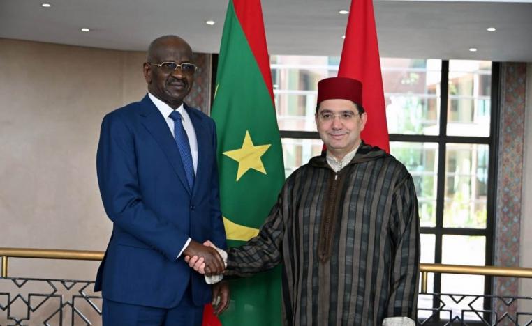 Ould Merzoug shaking hands with Bourita at Morocco's foreign ministry