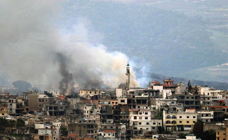 Smoke billows from the site of an Israeli strike in the southern Lebanese village of Khiam