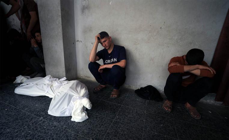 Mourners react during the funeral of Palestinians killed in Israeli strikes, at Al-Ahli Arab Baptist hospital, in Gaza City
