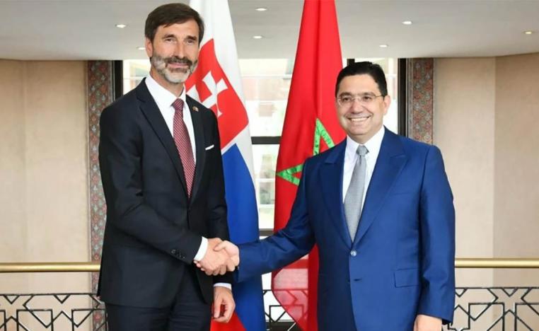 Bourita shaking hands with Blanár