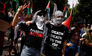 Palestine Action activists gathering outside the High Court in London 