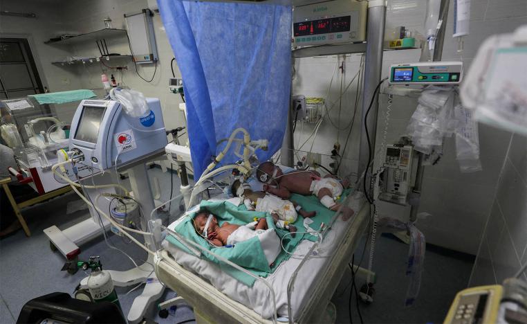 Palestinian newborns share an incubator at Al-Helou hospital due to fuel crisis