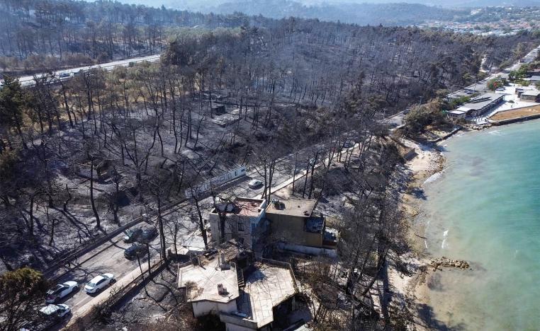 A drone view shows the aftermath of a wildfire in GuzelyaIi, Canakkale