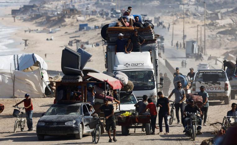 Displaced Palestinians fleeing northern Gaza due to an Israeli military operation
