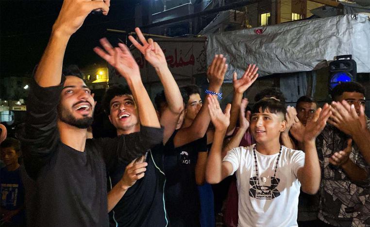 Gazans celebrate the ceasefire announcement