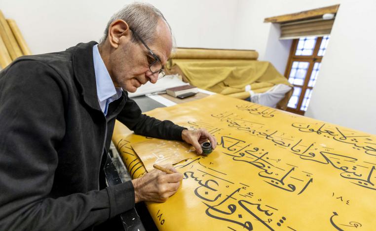 علي زمان صائغ يخلد اسمه بحروف القرآن