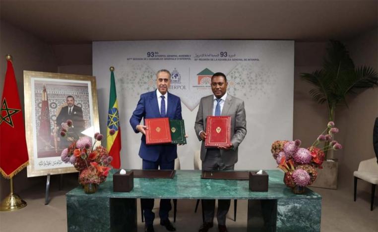 Hammouchi and Gebremichael during the signing ceremony