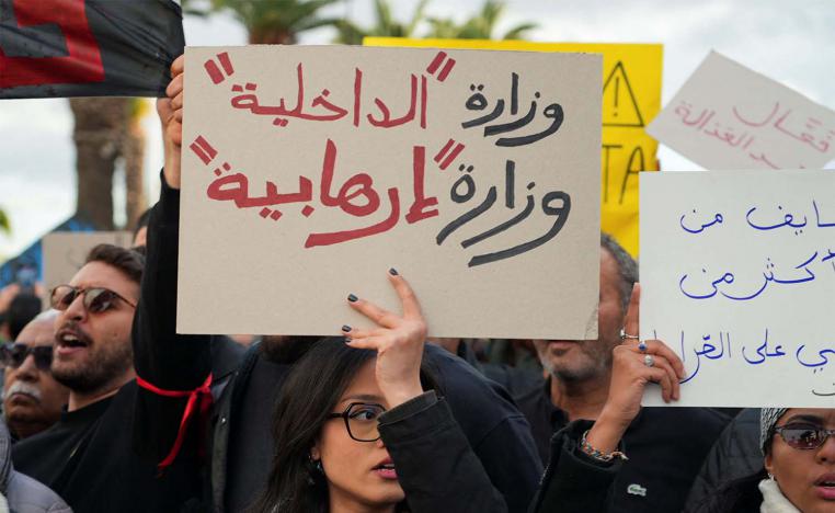 Protesters protest against Tunisia's President accusing him of entrenching one-man rule through the use of the judiciary and police