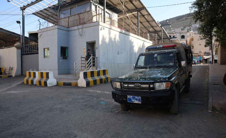 A police patrol vehicle is parked outside the United Nations’ compound following reports of UN staffers being detained by the Houthis, in Sana’a, October 29, 2025.