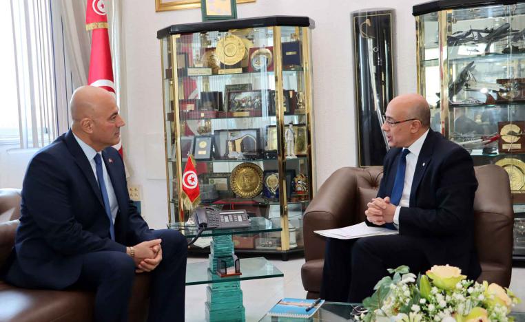 Tunisian Defence Minister Khaled Sehili speaks with US Ambassador Bill Bazzi during a meeting in Tunis, December 3, 2025. 