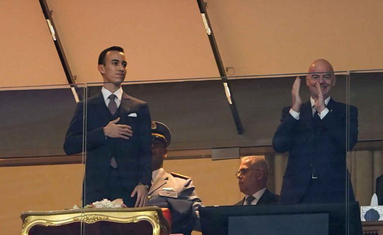 Morocco’s Crown Prince Moulay El Hassan and FIFA President Gianni Infantino in the stands at Prince Moulay Abdellah Stadium in Rabat, December 21, 2025.