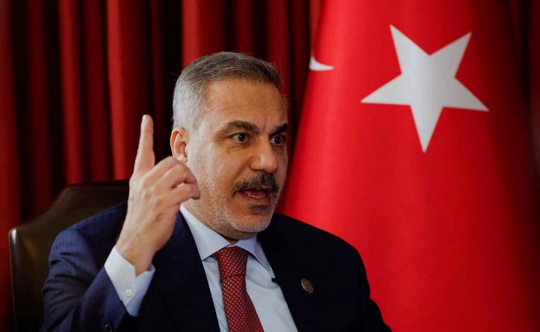 Turkish Foreign Minister Hakan Fidan speaks during an interview at the 23rd edition of the annual Doha Forum, in Doha, December 6, 2025. 