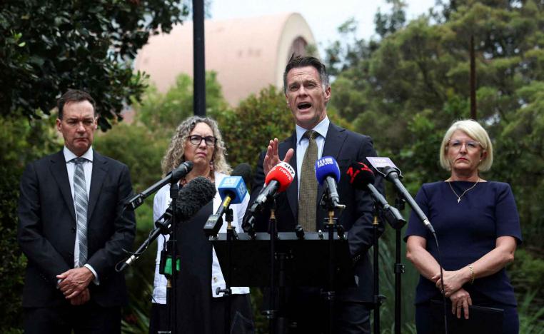 New South Wales Premier Chris Minns speaks during a news conference with Minister for Police and Counter-terrorism Yasmin Catley, and Stephen Bendle, the convener of the Australian Gun Safety Alliance (AGSA), at the NSW Parliament, in Sydney, December 22, 2025. 
