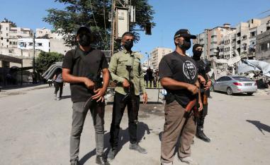 Hamas police officers stand guard, amid a ceasefire between Israel and Hamas, in Gaza City, October 11, 2025. 