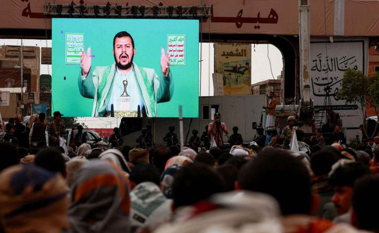 Supporters of Yemen’s Houthi movement watch a speech by the movements leader Abdul-Malik al-Houthi displayed on a big screen, during a rally in Sana’a, July 6, 2025. 