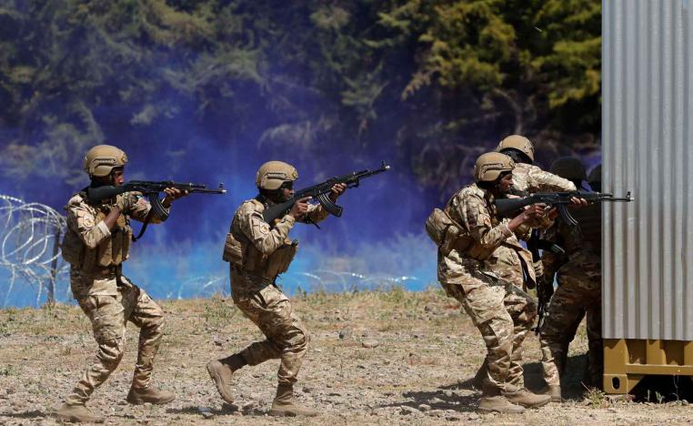 Multinational soldiers participate in a training during an exercise, aimed at enhancing combat readiness and crisis response, at the Umoja village within the Counter Insurgency Terrorism and Stability Operations centre in Nanyuki, Laikipia County, Kenya. 