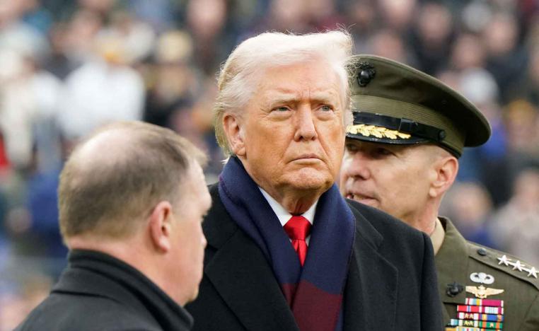 US President Donald Trump looks on ahead of the annual Army-Navy football game in Baltimore, Maryland, US, December 13, 2025. 