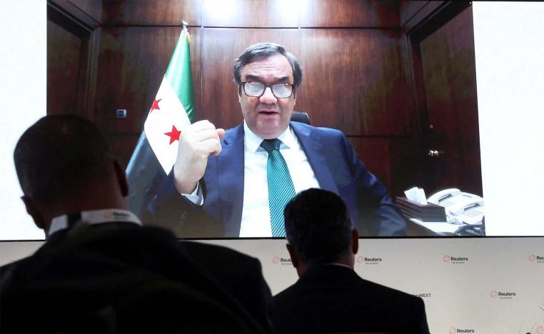 central bank Governor AbdulKader Husrieh