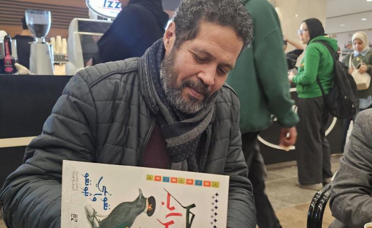 الشاعر والقاص أسامة جاد