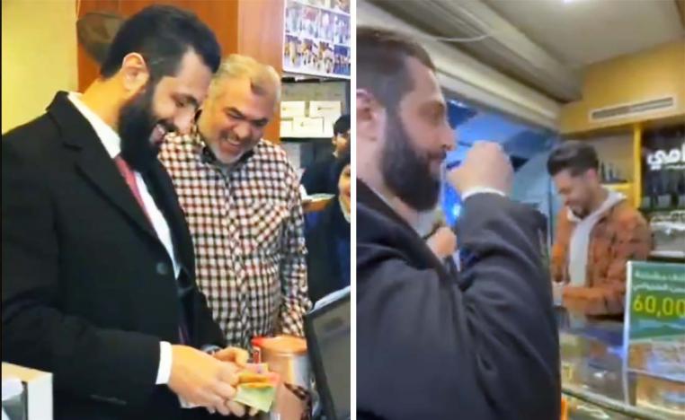 Sharaa seen using the new banknotes at a Damascus shop