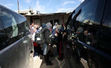 The Australian prisoners boarding the bus