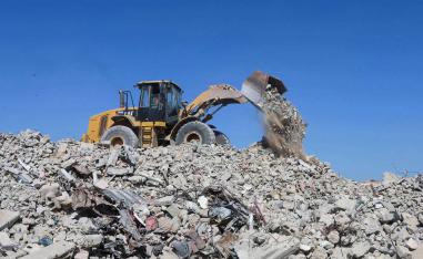 Progress is being slowed by dangers hidden beneath the debris