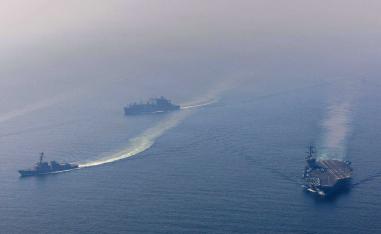 Talks advance amid threats, naval pause and Hormuz tensions