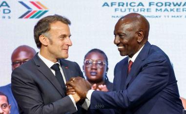 Macron and Kenya's President William Ruto shake hands during the Africa Forward Summit 2026 