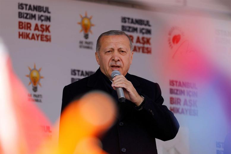 Turkish President Tayyip Erdogan addresses his supporters during a rally for the upcoming local elections in Istanbul