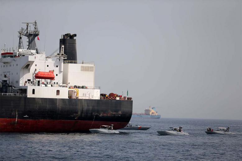 UAE Navy boats next to Al Marzoqah Saudi Arabia tanker attacked off the Port of Fujairah