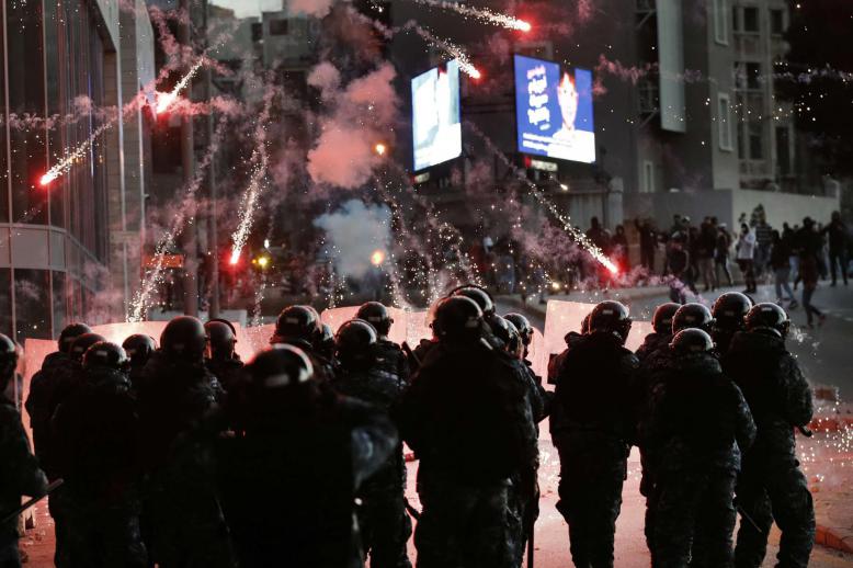 Anti-riot police intervened, firing teargas to disperse them.