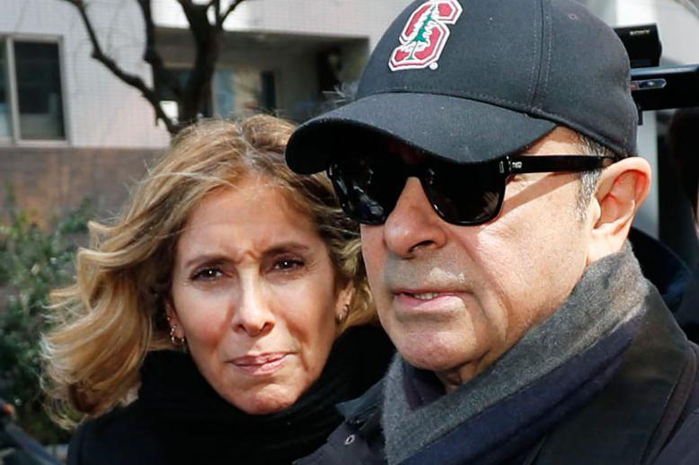 Former Nissan Chairman Carlos Ghosn, right, and his wife Carole in Tokyo