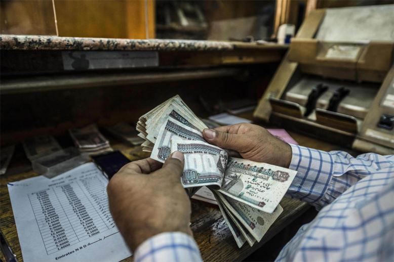 Banks were selling the US dollar at more than 18.5 pounds while buying it at over 18.45
