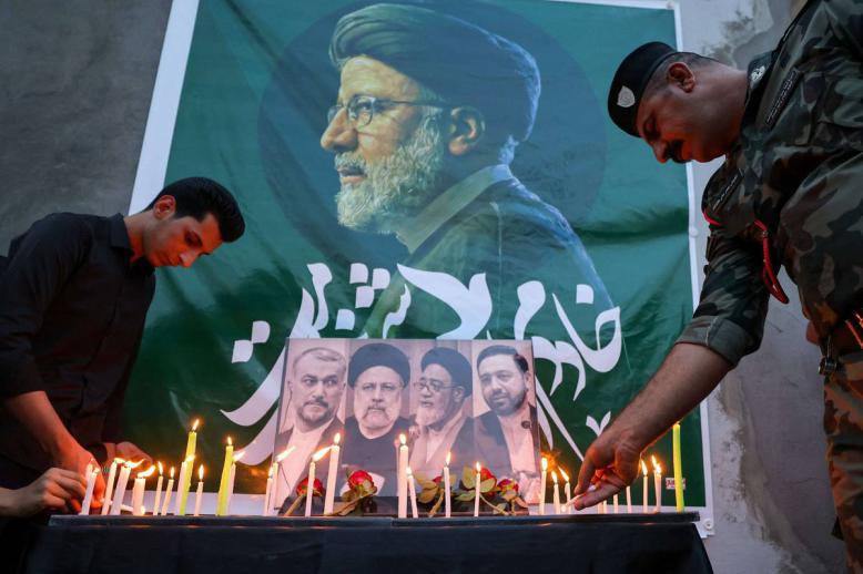 جدارية في بغداد لتأبين الرئيس الإيراني إبراهيم رئيسي