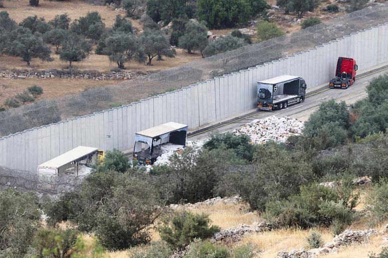 Israeli settlers attacked the trucks and they destroyed the products and set fire in trucks