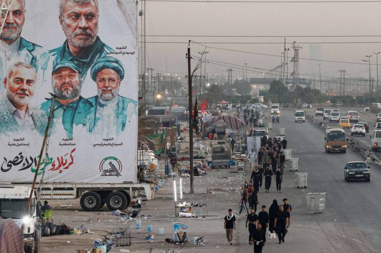 جدارية للحشد الشعبي على طريق بغداد - كربلاء