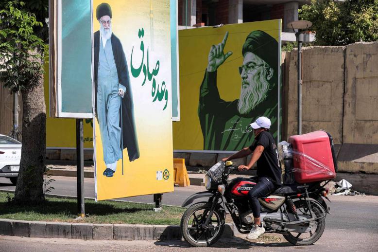 جداريات في بغداد للمرشد الأعلى علي خامنئي وزعيم حزب الله الراحل حسن نصرالله