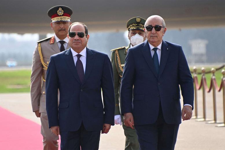 Algerian president Abdelmadjid Tebboune (R) and his Egyptian counterpart Abdel Fattah al-Sisi