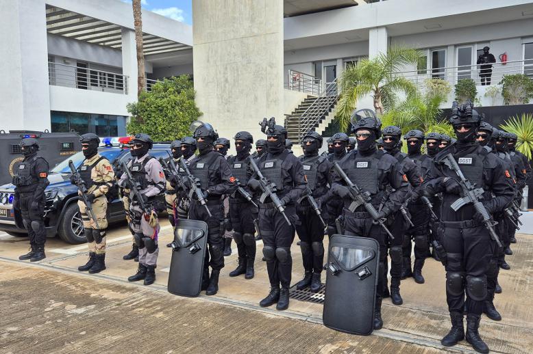 BCIJ security forces at the headquarters of the Central Bureau of Judicial Investigations in Sale