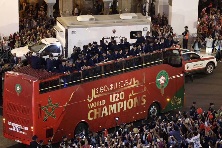 Moroccans gather to welcome Moroccos U-20 national football team, who were crowned 2025 FIFA U-20 World Cup champions, as they are paraded in Rabat 
