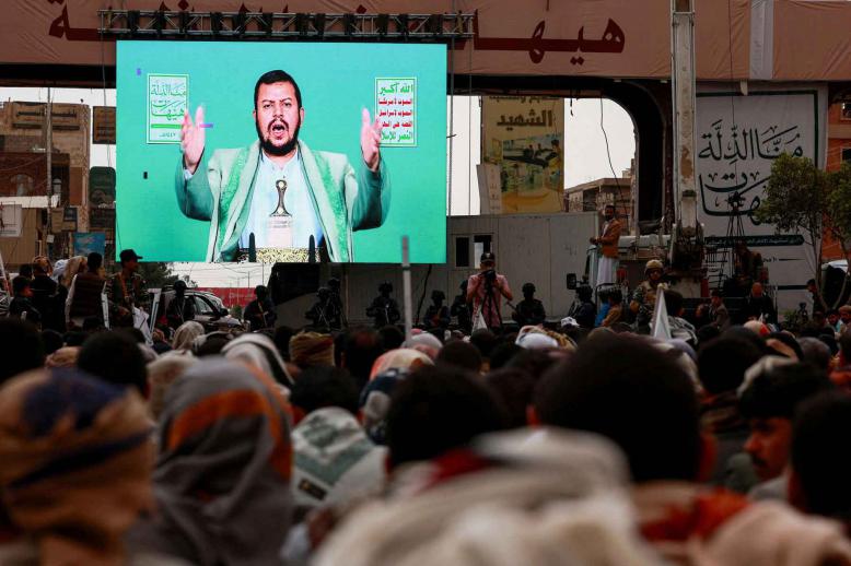 Supporters of Yemen’s Houthi movement watch a speech by the movements leader Abdul-Malik al-Houthi displayed on a big screen, during a rally in Sana’a, July 6, 2025. 