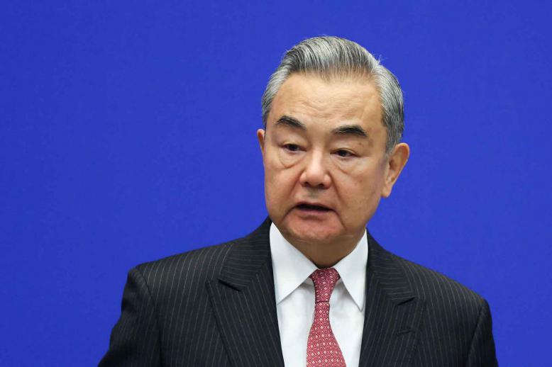 Chinese Foreign Minister Wang Yi speaks in Beijing, October 27, 2025. 