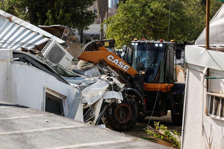 Bulldozers razed several large buildings and other smaller structures inside UNRAW’s compound