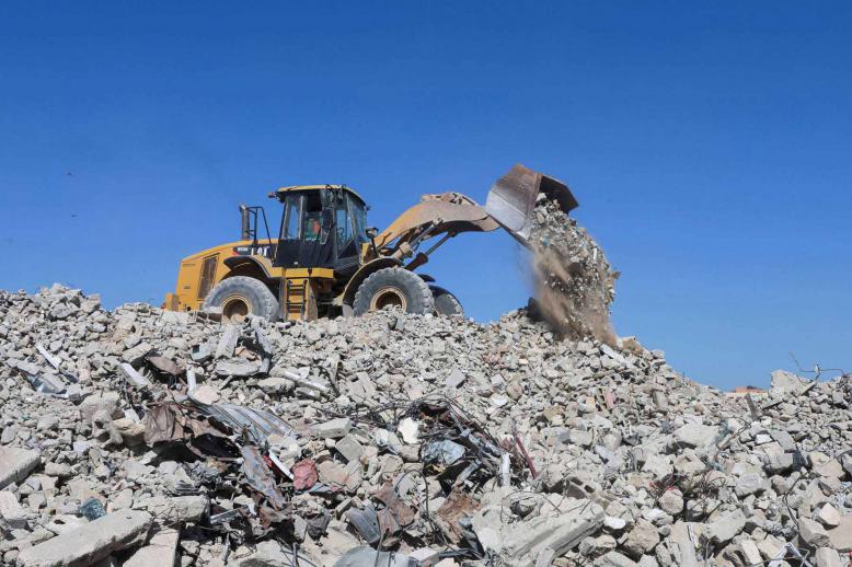 Progress is being slowed by dangers hidden beneath the debris
