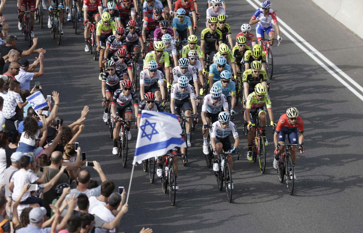 Israelis cheer on competitors during a second stage of Giro d'Italia, Tour of Italy cycling race.