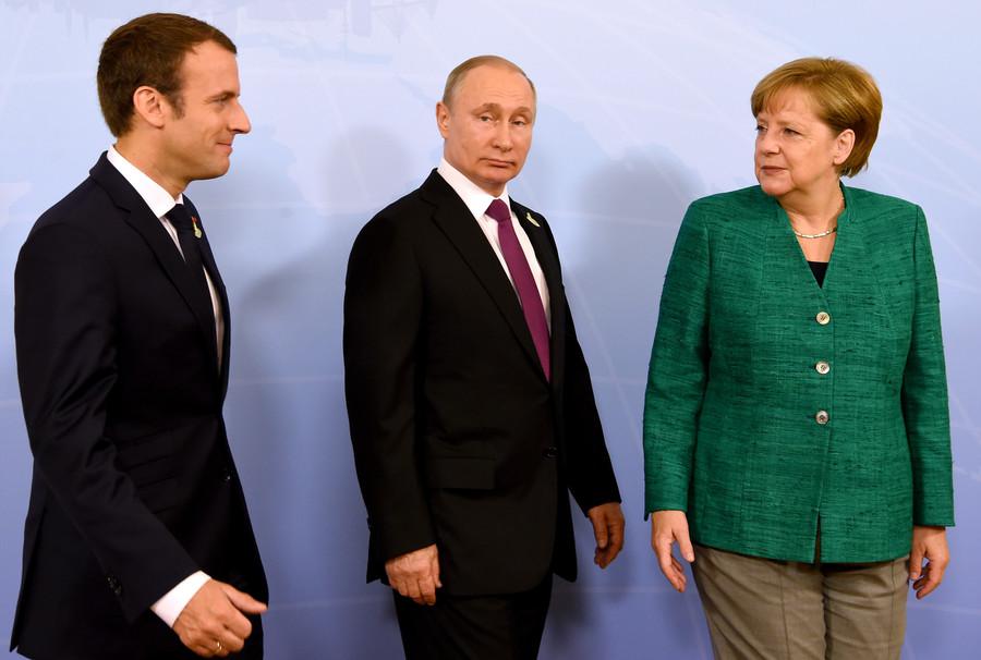 ميركل بوتين وماكرون