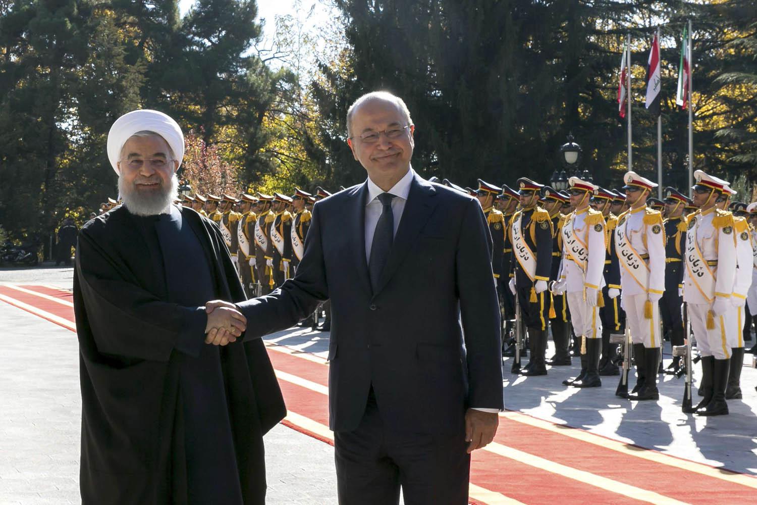 الرئيس الإيراني حسن روحاني يستقبل الرئيس العراقي برهم صالح