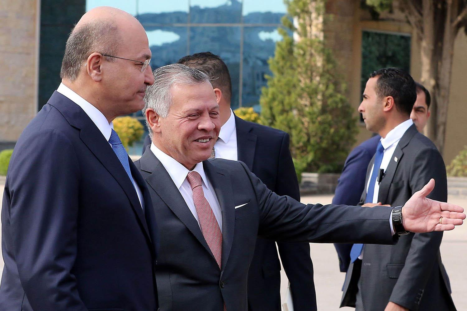 العاهل الأردني الملك عبدالله الثاني في استقبال الرئيس العراقي برهم صالح