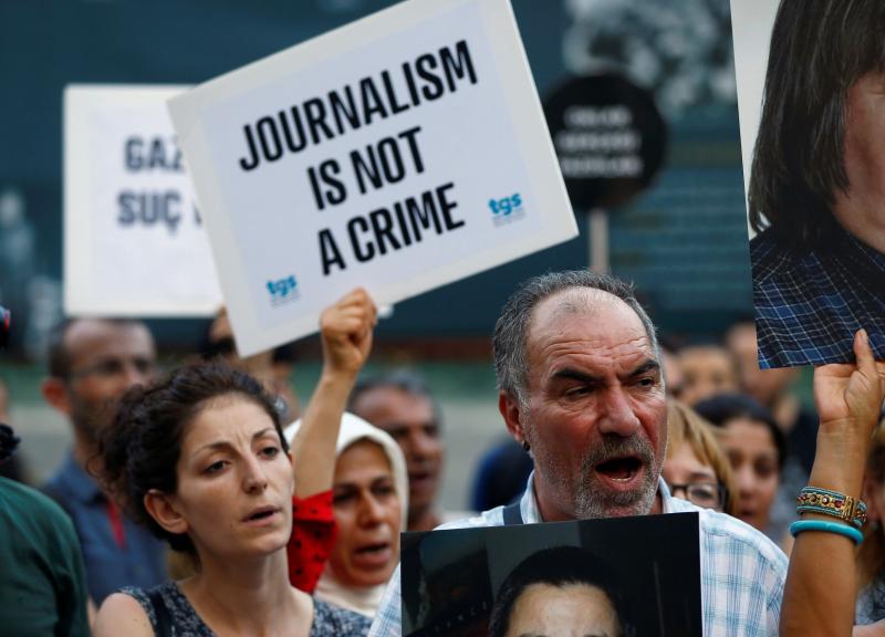 A 2016 file picture shows demonstrators shouting slogans during a protest against the arrest of prominent journalists in central Istanbul