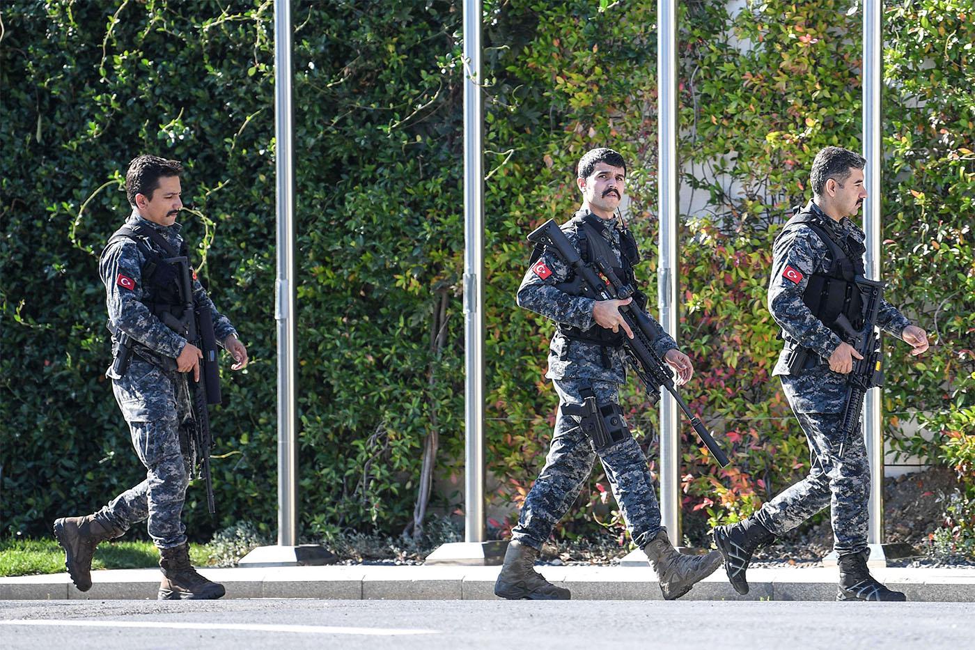 Turkish special force police officers patrol outside the Vahdettin Mansion in Istanbul 